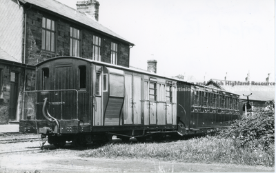 Brake 3rd No.2 (later 10) and bowsider at Harbour Station, Porthmadog