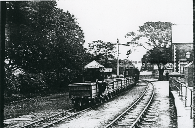Gravity train passing through Minffordd Station.